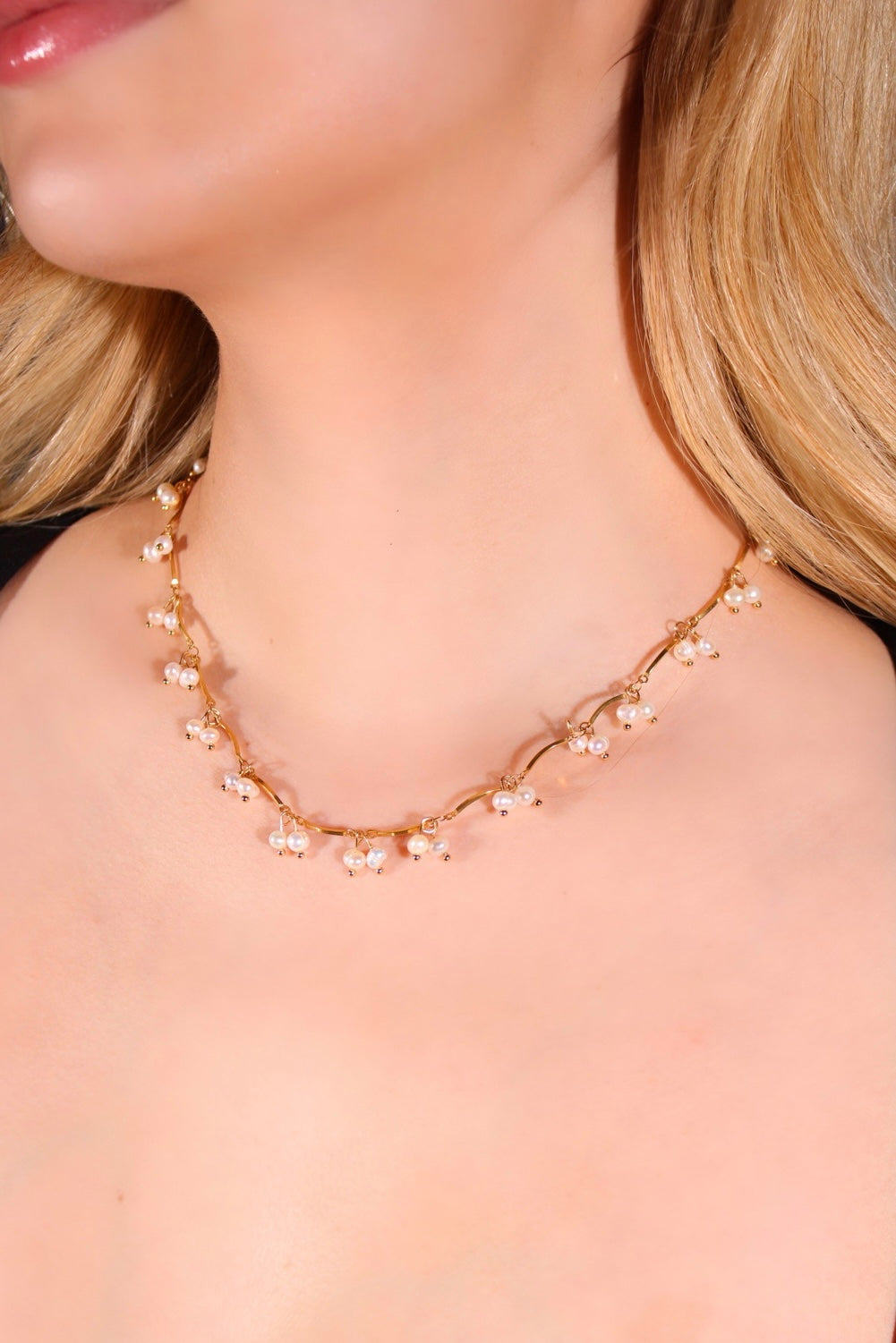 Collar de perlas colgantes